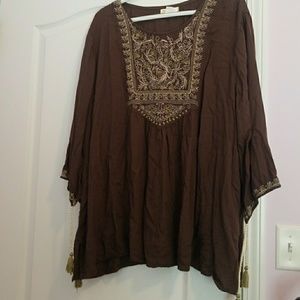 Brown top with green accents
